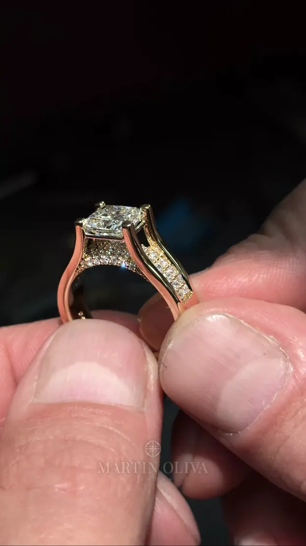 Statement diamond ring designed to show the centre stone from every angle